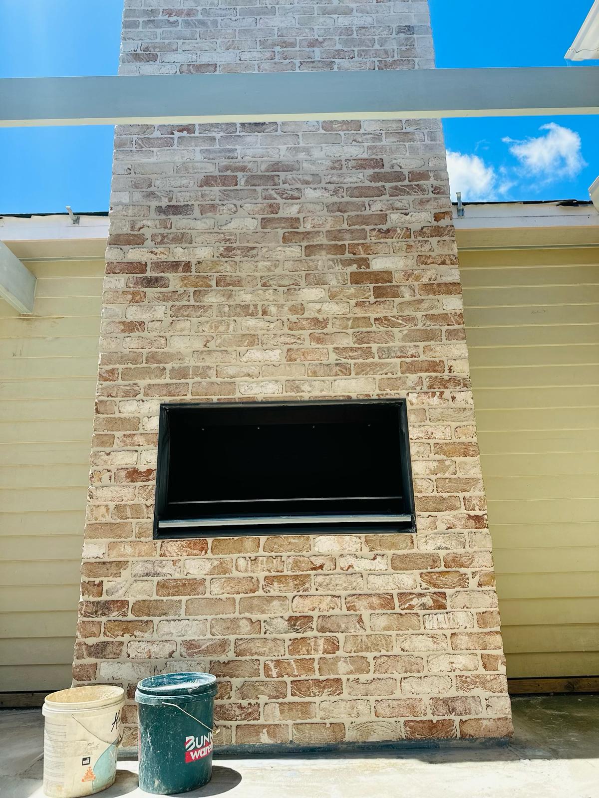 Chimney Facade with Thin Brick Cladding 